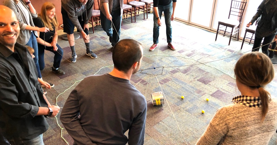 Toolhouse employees playing a game at the office.